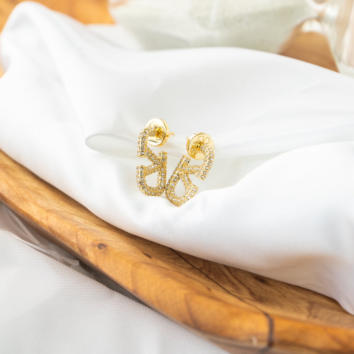 V earrings